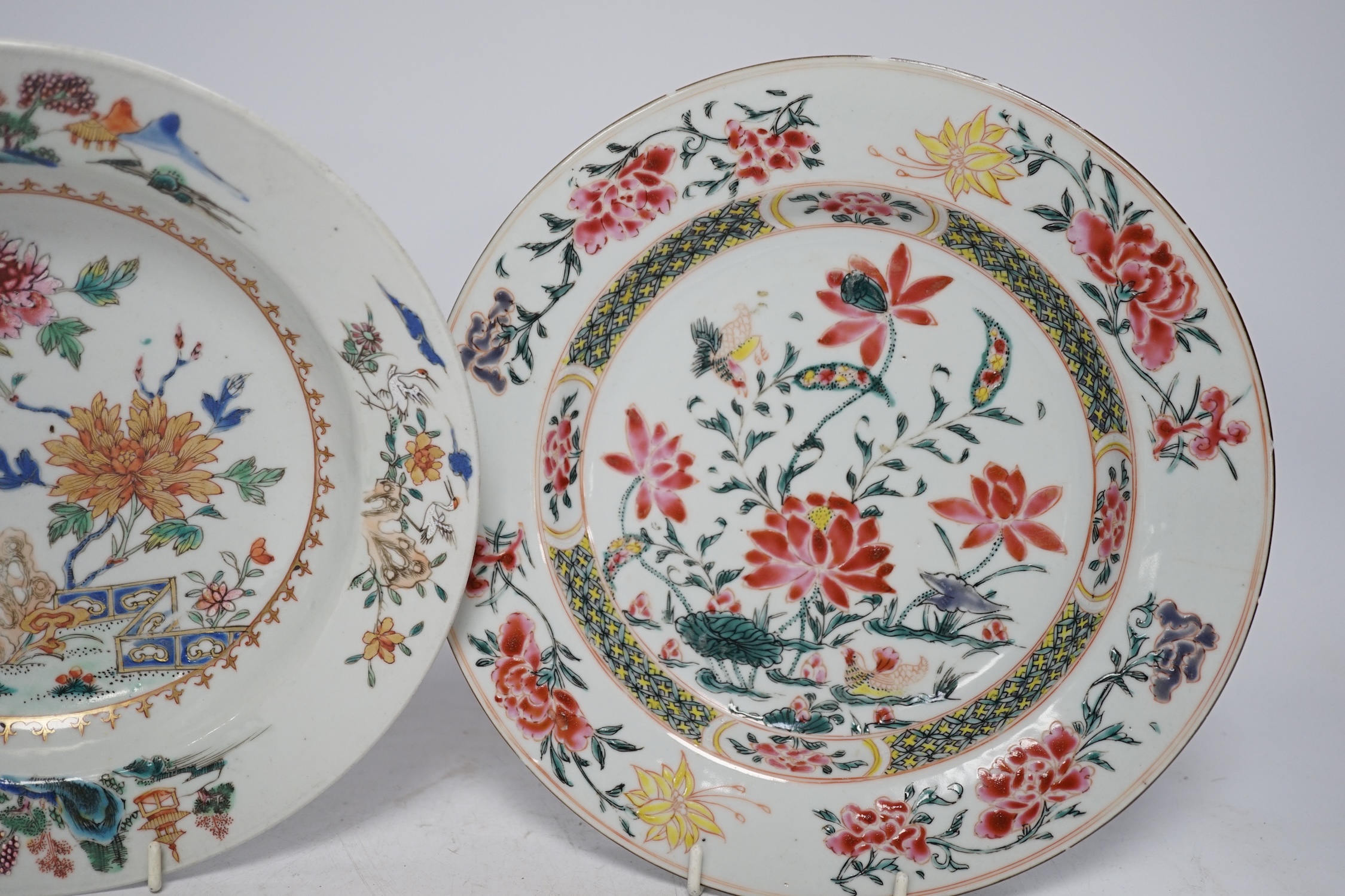 Two Chinese famille rose porcelain plates, mid 18th century, largest 23cm diameter